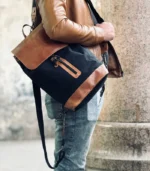 charcoal black and caramel leather backpack from Sukoon Leather made of pull-up leather and waxed canvas