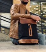 charcoal black and caramel leather backpack from Sukoon Leather made of pull-up leather and waxed canvas