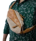 Sandstone Traveler leather crossbody bag by Sukoon worn chest